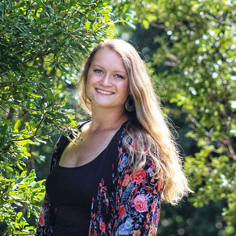 Photo of Katie in the trees.