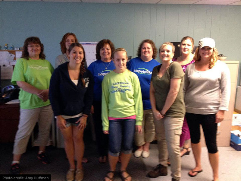 Angie (left) sharing a moment other Hopebridge Heroes in the original Kokomo location.