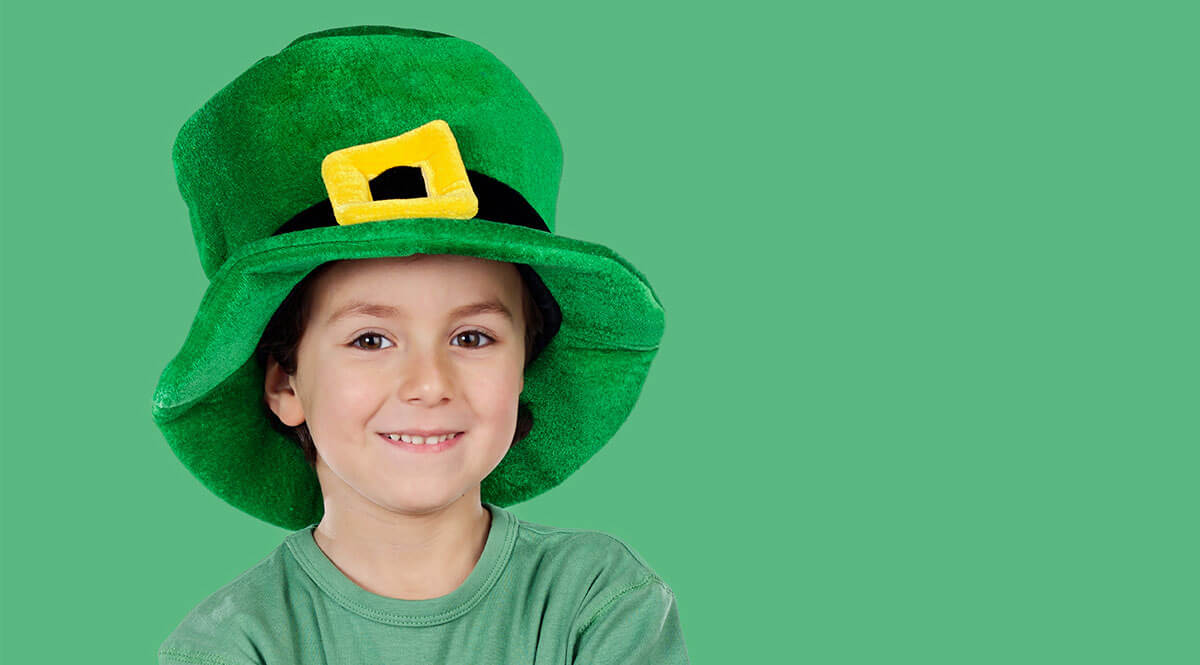 Boy in leprechaun hat.