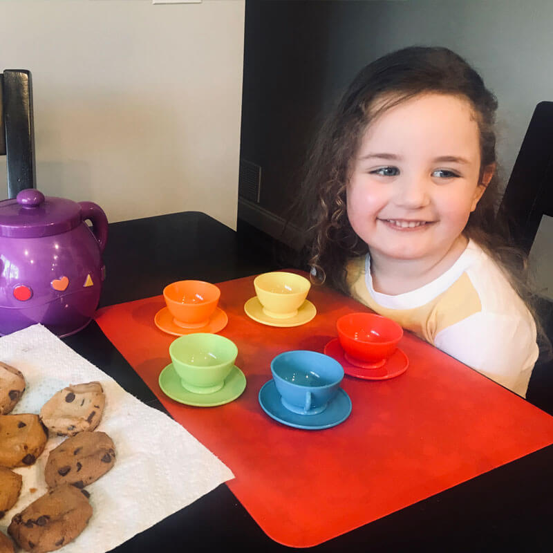 Norah preparing to have a tea party