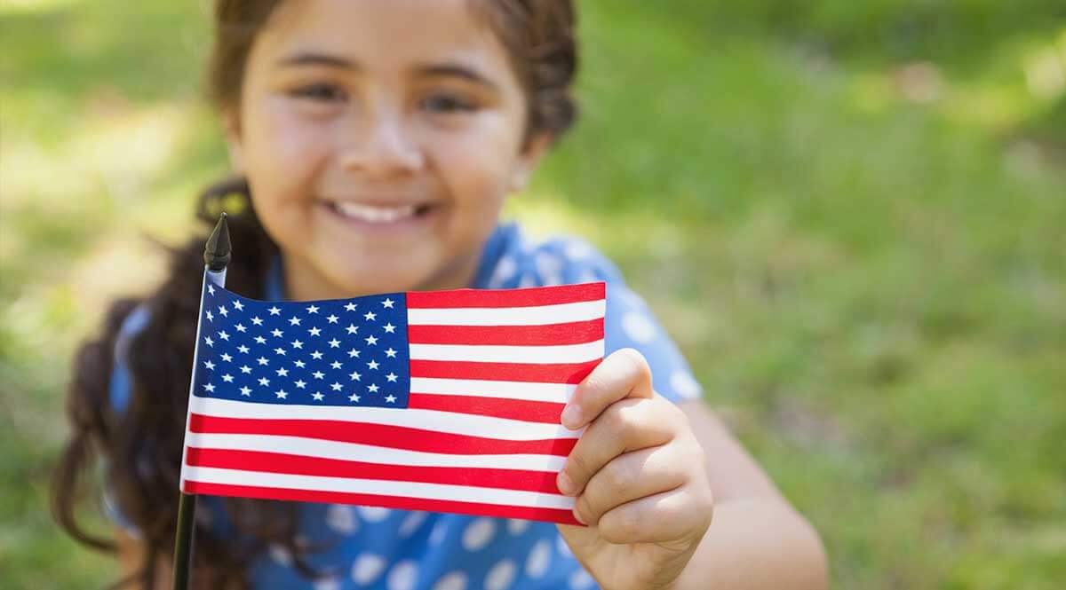 Young girl with autism and us flag