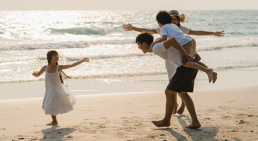 Young Happy Family Beach Florida