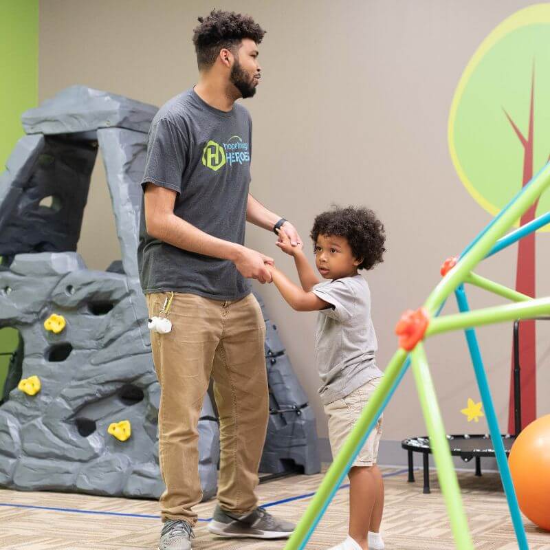 Hopebridge therapist working with a child