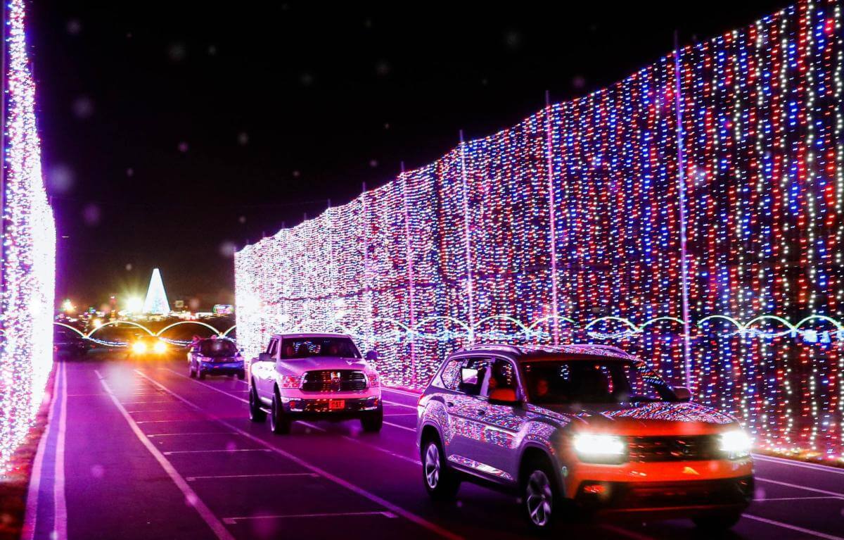 Cars driving past the lights during Speedway Christmas